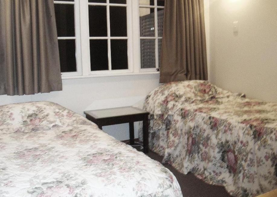 Okura Bush Browns Bay Olive Tree Motel & Apartment الغرفة الصورة